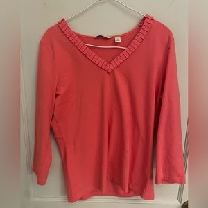 Womens top size medium brand is Liz Claiborne